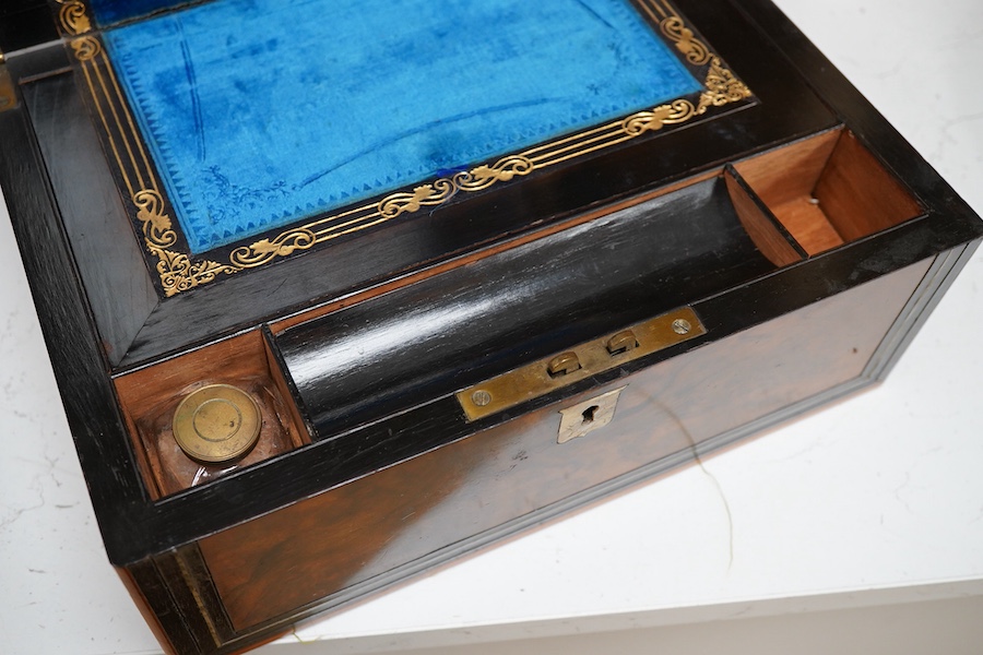 An early Victorian rosewood mother of pearl inlaid work box and burr walnut with slope